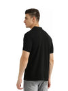 Men Solid Polo Neck Black T-Shirt